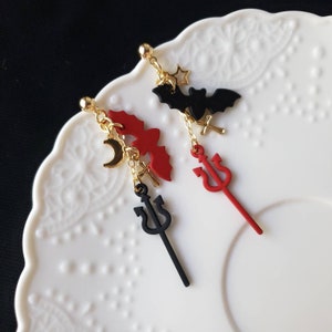Halloween bat and Trident earrings