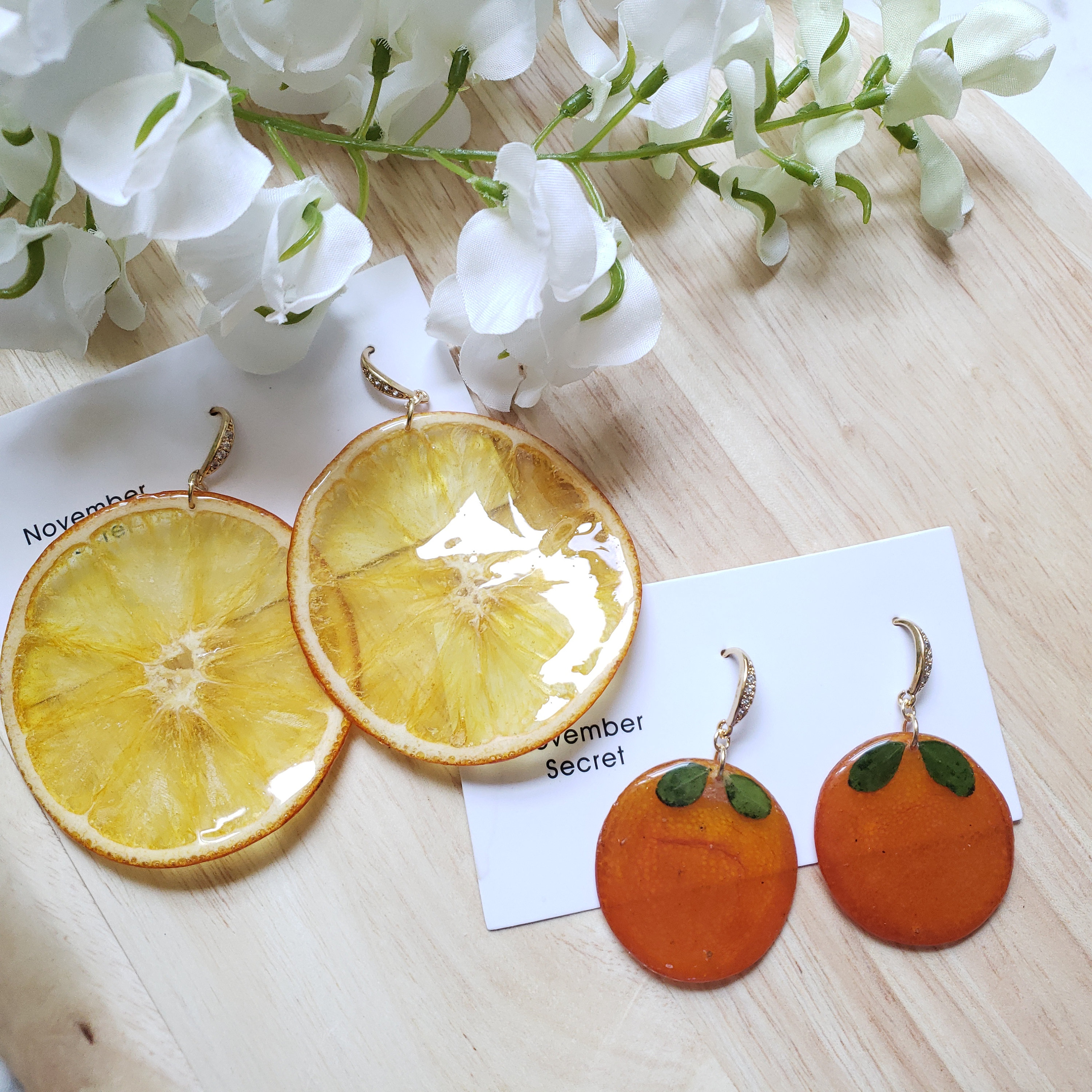 Orange resin earrings discount