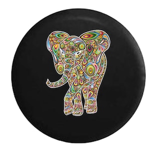 May include: A black spare tire cover featuring a colorful, patterned elephant design. The elephant is depicted in a vibrant array of colors, including green, yellow, blue, and red, with intricate details. The cover is round and designed to fit a standard tire.