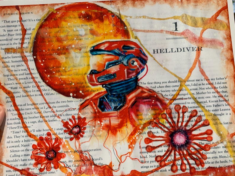 May include: An artistic illustration of a red armored figure in a helmet, positioned over a page of printed text. The artwork features a large orange sphere, swirling orange lines, and two red floral shapes with dark centers.