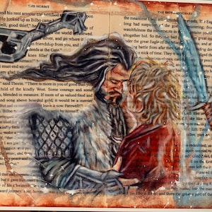 May include: Watercolor painting on a book page featuring two figures embracing, with a sword and key visible. The artwork is set against a backdrop of text from "The Hobbit," with warm tones and detailed brushstrokes.