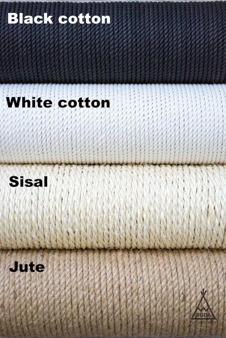 May include: Close-up of four spools of rope in black cotton, white cotton, sisal, and jute. The text "Black cotton", "White cotton", "Sisal", and "Jute" are printed above each respective spool. The jute spool is a light brown color.
