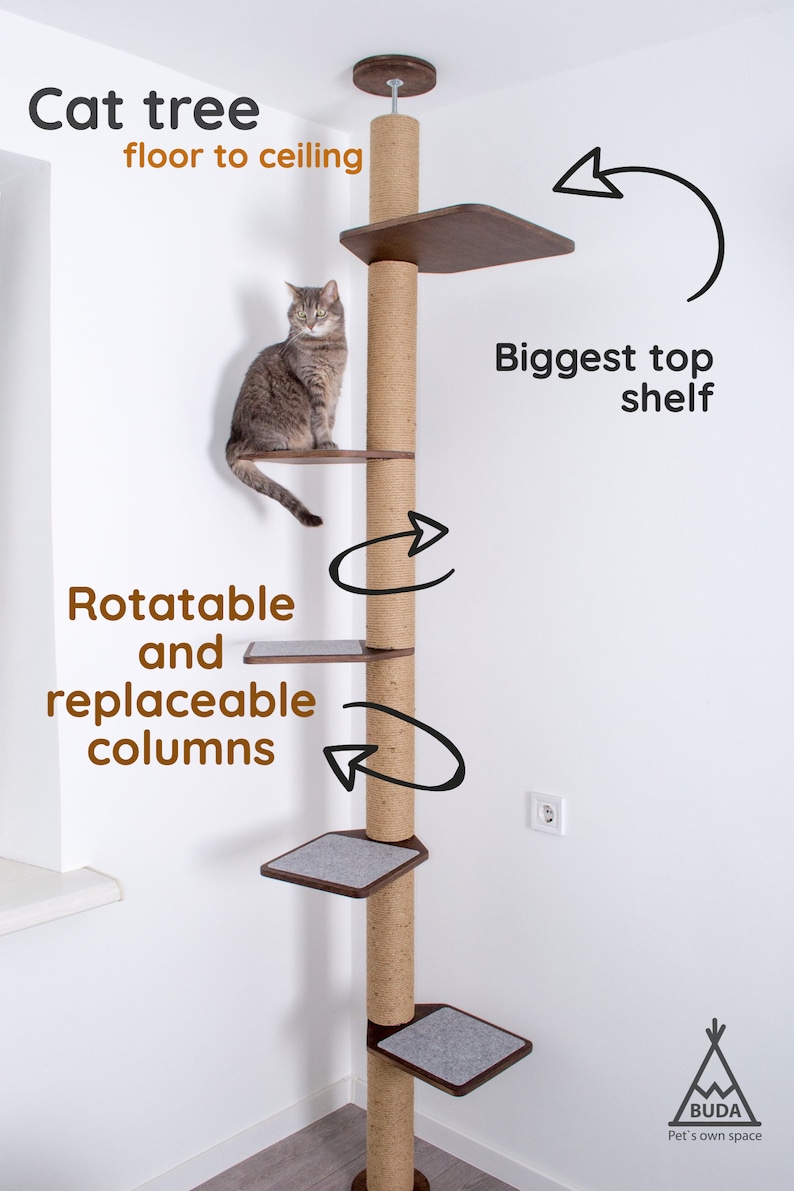May include: Floor-to-ceiling cat tree with multiple platforms and a central scratching post. The cat tree has a brown finish with gray platforms and is designed to be rotatable and have replaceable columns. The text "Cat tree floor to ceiling" is visible.