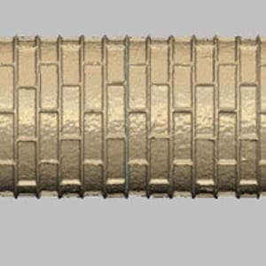 May include: A gold-coloured rolling pin with a textured surface that resembles a brick pattern.