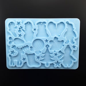 Silicone mold with 12 Cute engraved Christmas ornaments