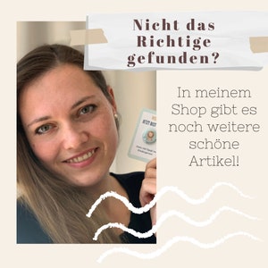 May include: A smiling person holds a card with text and a lion graphic. The image includes text in German: "Nicht das Richtige gefunden?" and "In meinem Shop gibt es noch weitere sch&ouml;ne Artikel!"