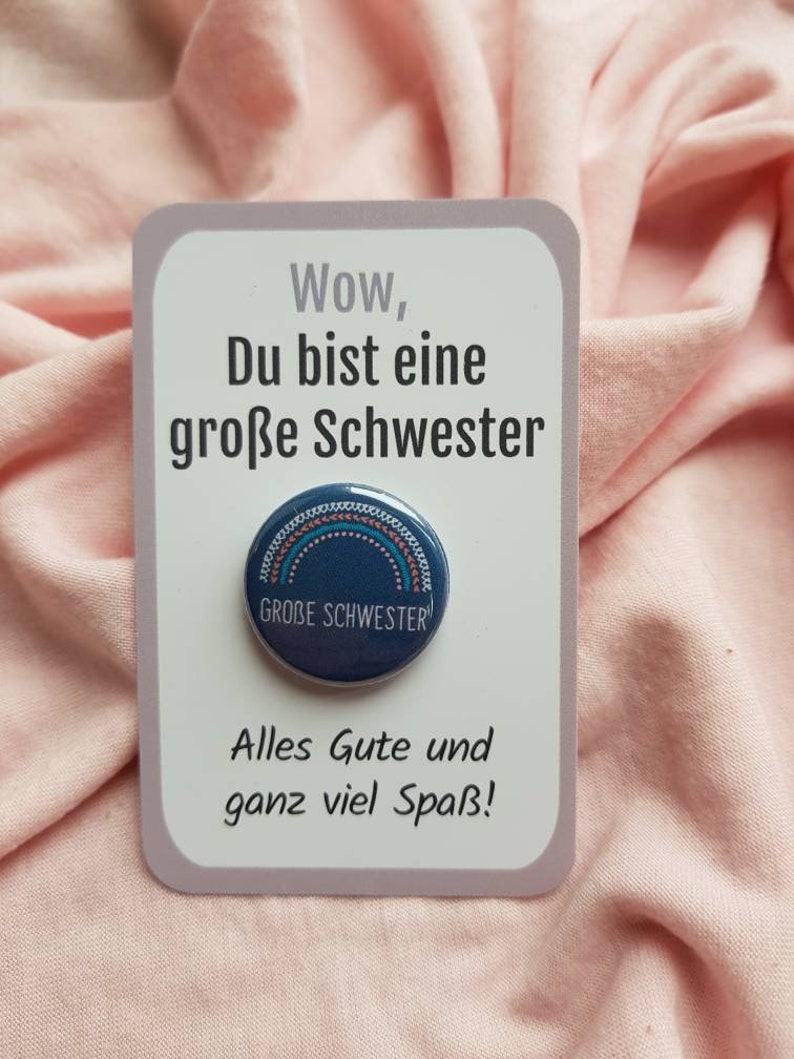 11 bezaubernde Geschenke für Geschwister zur Geburt des Babys - Für einen schönen Start! Button