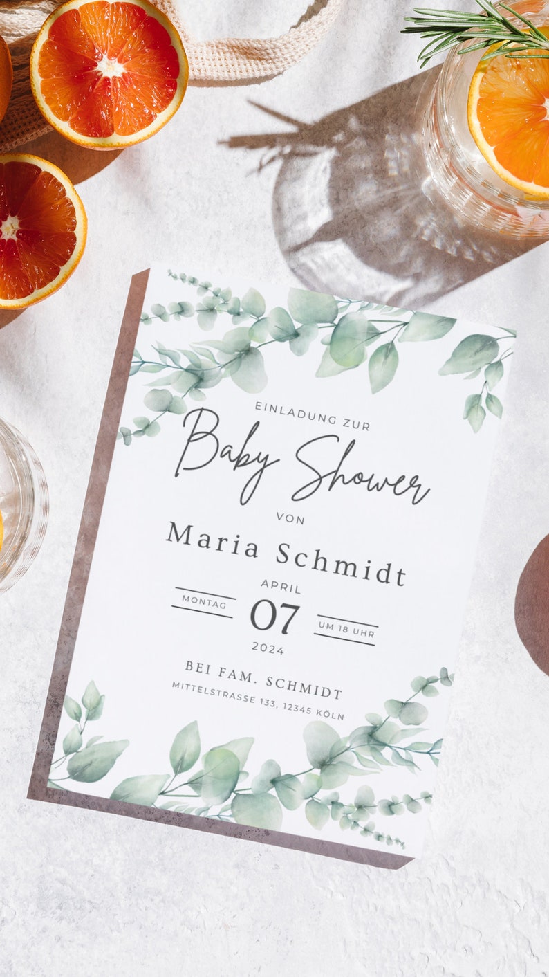 May include: A baby shower invitation with a watercolor eucalyptus leaf design. The invitation includes the text "Baby Shower" and details for Maria Schmidt's baby shower on April 7, 2024, at 6 PM. The invitation is on a white background.