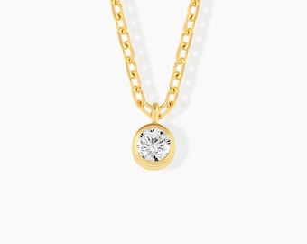 GELIN Diamond Solitaire on a Bail in 14k Solid Gold