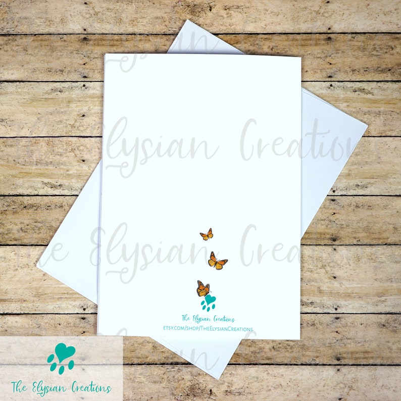 K&ouml;nnte beinhalten: Eine wei&szlig;e Karte mit einem t&uuml;rkisfarbenen Pfotenabdruck und drei orangefarbenen Schmetterlingen. Der Text "The Elysian Creations" und "ETSY.COM/SHOP/THEELYISIANCREATIONS" ist auf der Karte gedruckt.