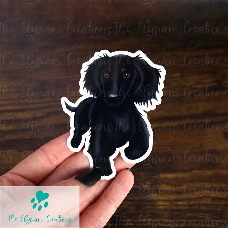 May include: A black and white sticker of a cartoon dachshund dog with brown eyes. The dog is standing on its hind legs with its front paws raised.