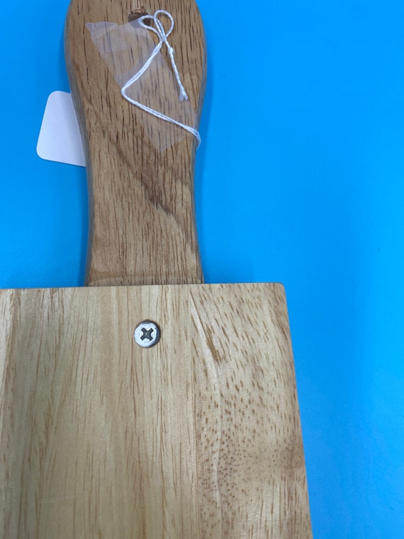 Tagliere a forma di Texas in legno massello con manico -  Italia