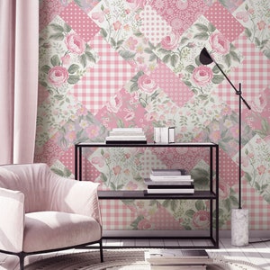 May include: A pink and white floral wallpaper with a patchwork design. The wallpaper features a variety of floral patterns, including roses, gingham, and polka dots.