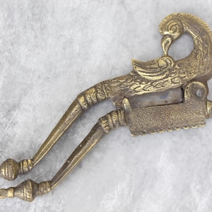 Vintage Brass Peacock Nutcracker: Ornate Home Decor