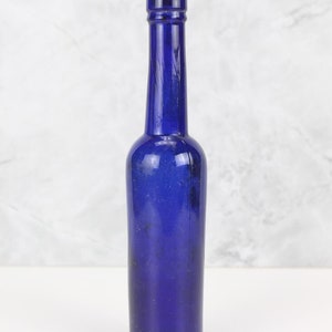 Antique Cobalt Blue Glass Apothecary Bottle: Vintage Medicine Collectible