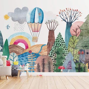 a living room with a large mural of animals and hot air balloons