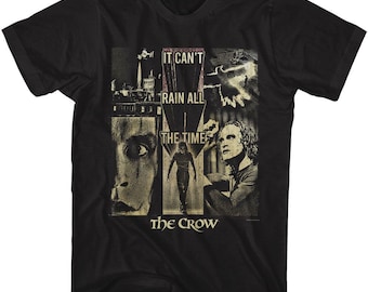 May include: Black t-shirt with a graphic print of a man from the movie "The Crow". The graphic includes the text "It can't rain all the time" and a cityscape.