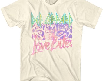 May include: A white t-shirt with a faded, colorful graphic of a tiger's eyes and the text "Def Leppard Love Bites".