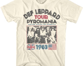 May include: A vintage-style t-shirt featuring a band photo of Def Leppard, the text "Def Leppard Tour Pyromania", and the text "United States of America". The shirt also features the year "1983" and the flags of the United Kingdom and the United States.