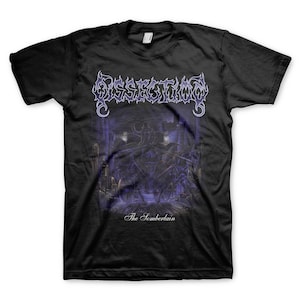 May include: Black t-shirt with a purple and white band logo that says "Dissection" and a graphic of a carriage pulled by horses in a dark, shadowy setting. The text "The Somberlain" is printed below the graphic.