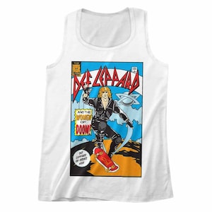 May include: White tank top featuring a comic book-style graphic. The graphic includes the band name "Def Leppard" in red, a figure skateboarding, and the text "And The Women of Doom". The tank top is a classic sleeveless design.
