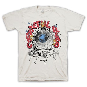 May include: A white t-shirt with a graphic of a skull with a speaker for a head. The skull is surrounded by the words "Grateful Dead" and dancing skeletons. The graphic is in red, blue, and black.