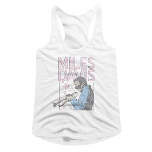 May include: White tank top featuring a vintage-style graphic of Miles Davis playing a trumpet. The graphic is in pink and blue with white stars.