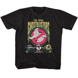 May include: Black t-shirt with a graphic of the Ghostbusters logo, a ghost, and the text "The Real Ghostbusters".
