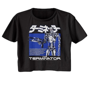 May include: Black cropped t-shirt with a graphic of a robot holding a gun. The text "Terminator" is printed in white on a blue background. The Japanese text "ターミネーター" is printed in white above the robot.