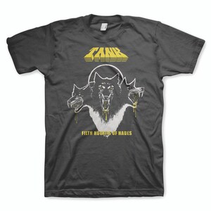May include: A dark gray t-shirt with a gold graphic of a three-headed wolf with dripping gold. The text "TANK" and "FILTH HOUNDS OF HADESS" are in gold lettering.