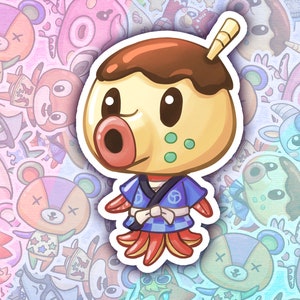 May include: A cartoon illustration of a tan animal character with a brown hat, a blue and white kimono, and a red and orange tail. The character has a large, round, pink nose and green eyes. The character is surrounded by other cartoon animal characters.