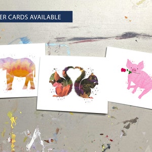 May include: Three watercolor art cards featuring animal illustrations. One card shows a pink elephant with a heart, another depicts two squirrels forming a heart shape, and the third shows a pink pig with a rose. The text "OTHER CARDS AVAILABLE" is at the top.