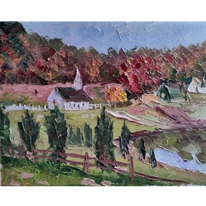 May include: A painting of a white church with a brown roof in a rural landscape. The church is surrounded by trees with red, orange, and yellow leaves. There is a white picket fence in front of the church.