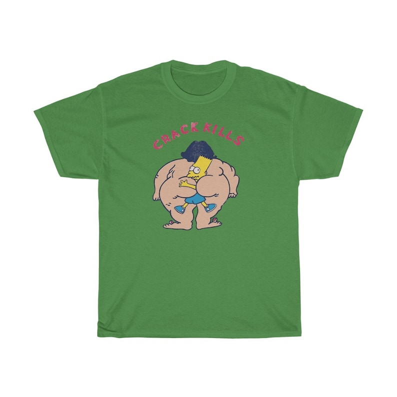 May include: Green t-shirt featuring a cartoon image of a yellow character with blue hair and a blue shirt, hugging a larger yellow character wearing a blue shirt. The text "CRACK KILLS" is above the characters.