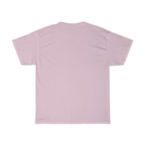 May include: A plain, light pink t-shirt with short sleeves.