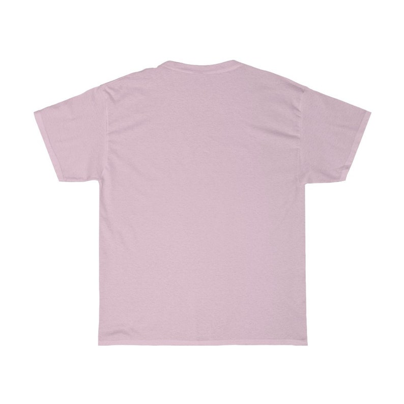 May include: A plain, light pink t-shirt with short sleeves.