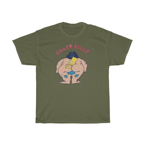 May include: A green t-shirt featuring a cartoon image of a yellow character wearing blue shorts and a black hairdo. The text "CRACK KILLS" is printed in pink above the image.