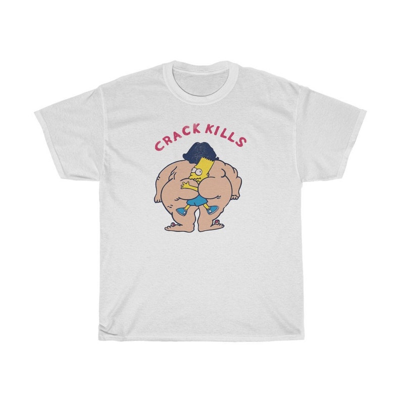 May include: White t-shirt featuring a cartoon image of a large, yellow character with a blue shirt and black hair, holding a smaller, yellow character with black hair. The text "CRACK KILLS" is above the characters.