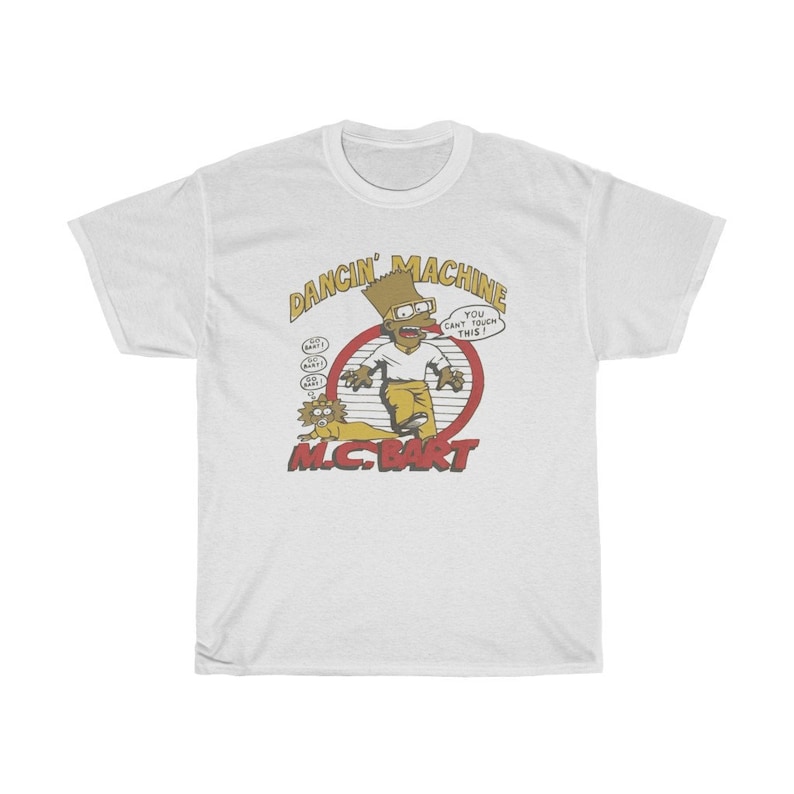 May include: White t-shirt featuring a cartoon illustration of a yellow-skinned character with a blue afro, wearing a white shirt and yellow trousers, dancing with a dog. The text "Dancin' Machine" is above the character and "MC. BART" is below. The text "You can't touch this!" is in a speech bubble above the character.