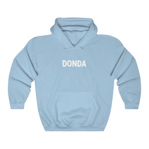 May include: A light blue hoodie with a white "DONDA" logo printed on the front.