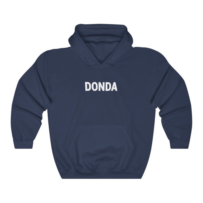 May include: A navy blue hoodie with a white "DONDA" logo printed on the front.
