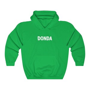 May include: A green hooded sweatshirt with the word "DONDA" printed in white on the front.