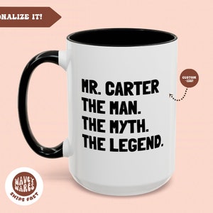 May include: White ceramic mug with a black interior and handle. The mug features the text "MR. CARTER THE MAN. THE MYTH. THE LEGEND." in bold black letters. The mug is a customizable item.