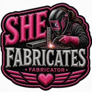 May include: A patch featuring a welder wearing a black and pink helmet and gloves, working on metal with sparks. The text reads SHE FABRICATES FABRICATOR in bold pink and silver lettering, with a pink heart and stylized wings at the bottom.