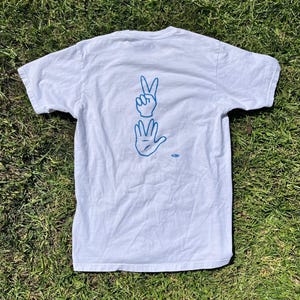 売れ筋商品|||エルエーポップアート Tシャツ トップス レディース Women's Word Art Peace Out T-shirt Pink LA Pop Art Women's Word Art T-shirt - Peace Out - Etsy