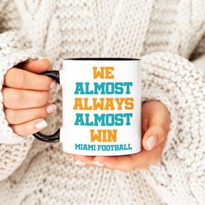 Miami Dolphins, We Almost Always Almost Win, Football Coffee Mug, Sports Cup, Funny Gift Idea Funny NFL Gift, Sport Themed Mug, Gift for Him 11oz Black