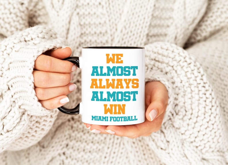 Miami Dolphins, We Almost Always Almost Win, Football Coffee Mug, Sports Cup, Funny Gift Idea Funny NFL Gift, Sport Themed Mug, Gift for Him 11oz Black