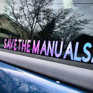 May include: A blue car with a pink and blue sticker that says "SAVE THE MANUALS" with a stick shift gear symbol.