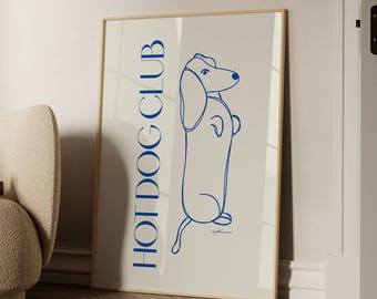 Può includere: Un poster bianco con testo blu che recita "HOT DOG CLUB" e un disegno a linea blu di un bassotto. Il poster ha il testo "BY GABIS" in basso.