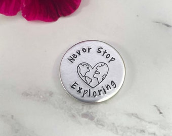 Never stop exploring token, going travelling gift, bon voyage pocket coin, good luck